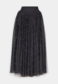 Jupe longue en tulle noir avec taille élastique et petites décorations de perles blanches dispersées sur tout le tissu.