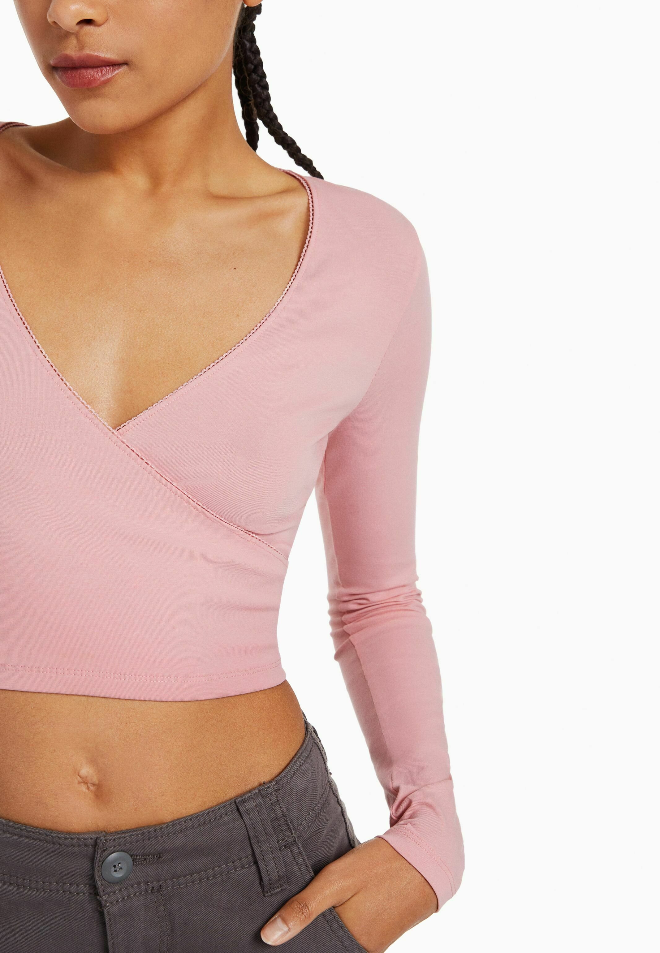 long sleeve light pink crop top