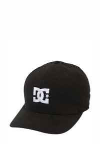 Black baseball cap made of cotton fabric, featuring a white embroidered DC logo on the front. Curved brim with ventilation eyelets.