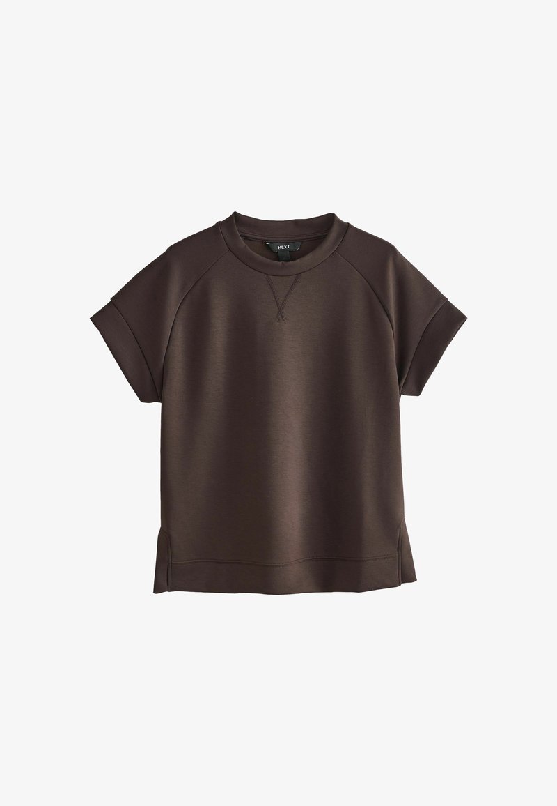 Biezu īsām piedurknēm brūns sporta krekls ar apaļu kakla izgriezumu, raglanu piedurknēm un taisnu apakšmalu. Gluda tekstūra un šuvju detaļas.