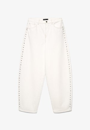 White high-waist wide-leg jeans with front pockets, button and zipper closure, and silver studs running vertically along the outer sides.
