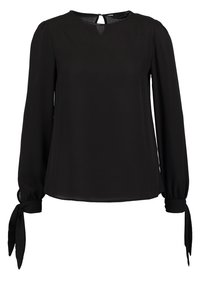 Blouse noire à manches longues avec col rond, fermeture par bouton avec œillet au dos et liens aux poignets.