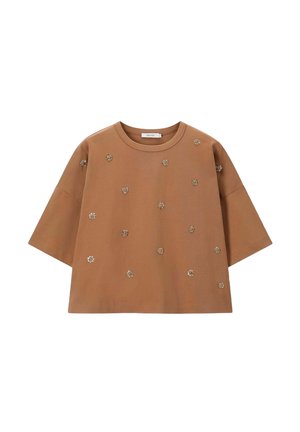 Bruine kortlopende top van katoen, met geborduurde bloemenaccenten, een ontspannen pasvorm en een ronde halslijn.