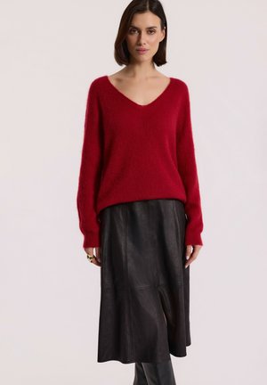 - Sweter