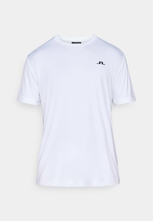 Hvid kortærmet t-shirt lavet af glat stof, med et diskret sort logo på venstre bryst. Rund halsudskæring og afslappet pasform.