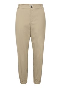 Beiga byxor med en tapered design vid ankle, elastiska muddar, knappstängning och standard midja, tillverkade av ett glatt tyg.