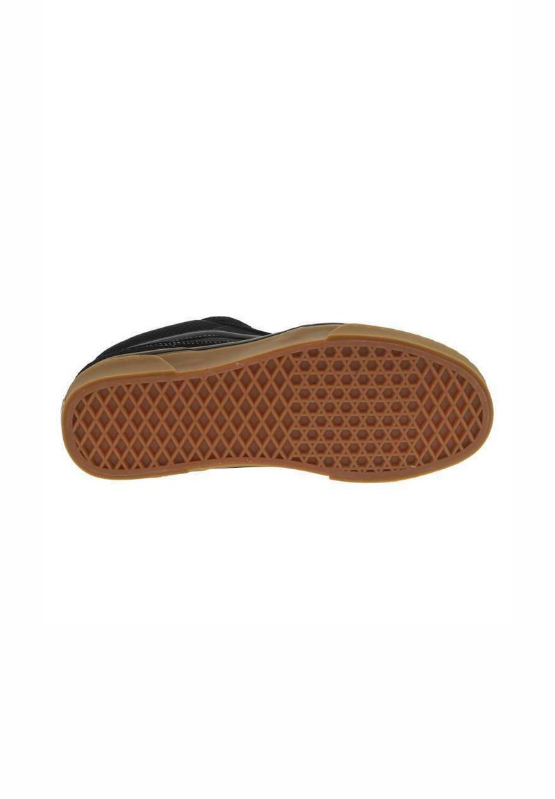 Schwarze Sneaker mit strukturiertem Gummisohle, die ein Wabenmuster aufweist. Die Sohle ist hellbraun und kontrastiert mit dem dunklen Obermaterial.