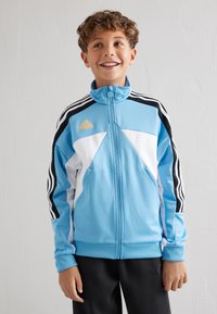 adidas Performance TIRO NATIONS PACK UNISEX - Treniņjaka - light blue/white/black/hazy beige