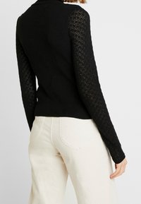 ONLY Stickad tröja - black