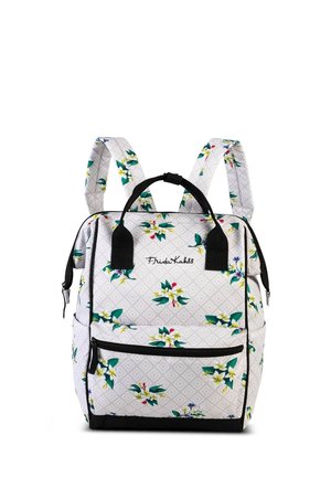 White floral backpack with a geometric pattern, black accents, top handle, and adjustable straps, featuring bright yellow and green flowers.