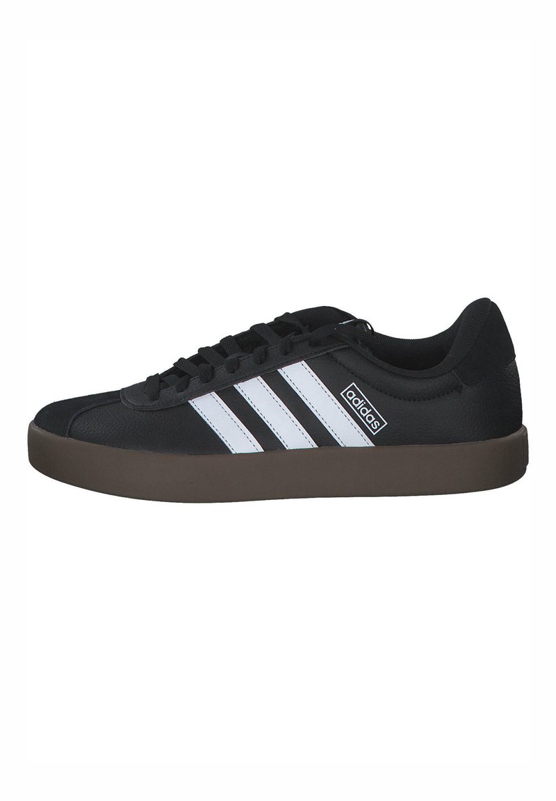 Black athletic shoes featuring three white stripes, a textured synthetic upper, lace-up closure, and a brown rubber sole.