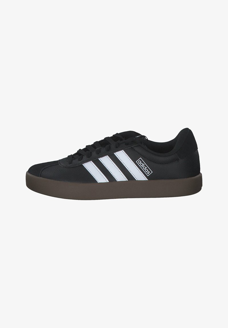 Black athletic shoes featuring three white stripes, a textured synthetic upper, lace-up closure, and a brown rubber sole.
