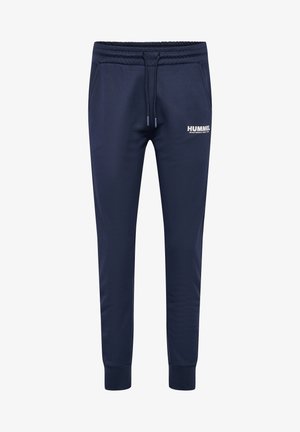 Navy blue joggers made of smooth fabric, featuring an elastic waistband with drawstring, tapered legs, and a small white logo on the thigh.