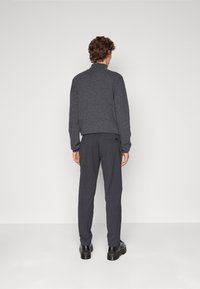 Calvin Klein Tygbyxor - mottled dark grey