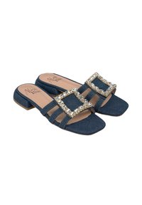 Denim slide sandals with a square toe, three strap design, and a large rhinestone buckle accent. Low block heel for stability.