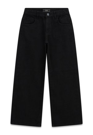 Sorte jeans med brede ben, forlommer, bæltestropper og knaplukning, lagt fladt på en hvid baggrund.