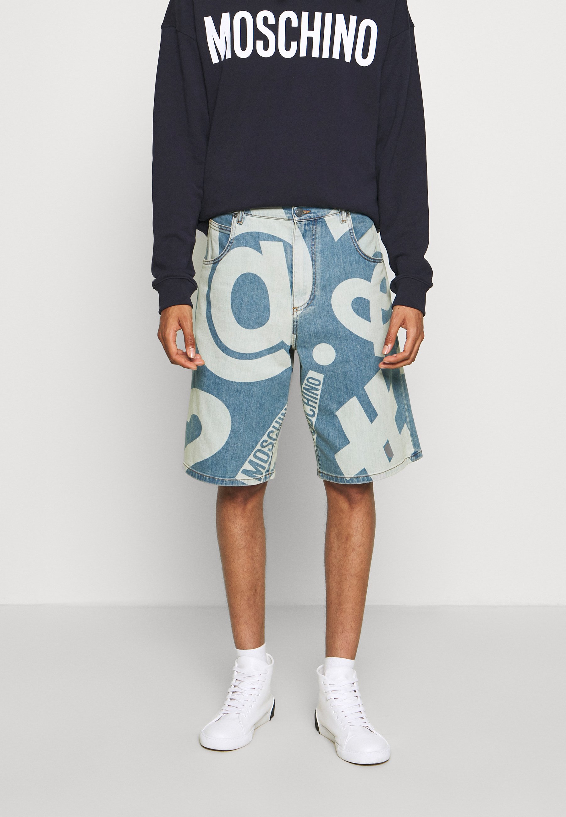 MOSCHINO TROUSERS - Denim shorts 