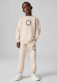 smALLSAINTS REGULAR FIT - TIERRA CUFFED LOGO JOGGERS - Træningsbukser - neutral