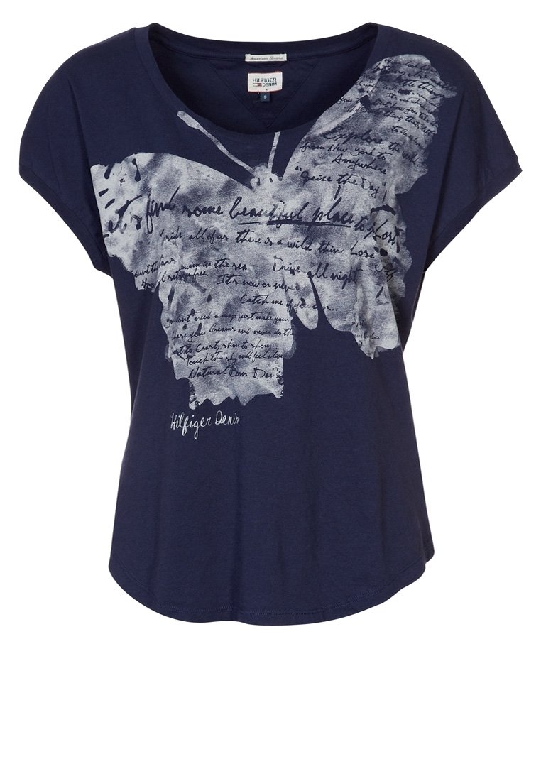 Mörkblå bomulls t-shirt med korta ärmar, prydd med en stor vit fjärils grafik och handskriven text över framsidan.