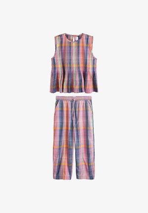 Varrukateta peplum-topp ja nööriga püksid mitmevärvilises pastellruudulises mustris, millel on roosa, oranži, sinise ja rohelise toonid.