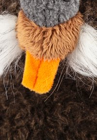 Plush duck toy featuring a gray woolen head, brown fuzzy body, orange felt beak, and white fuzzy accents by the ears. Textured surfaces present.