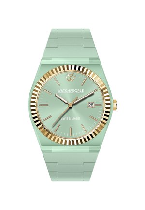 Reloj verde menta con forma hexagonal, bisel dorado y pulsera de eslabones con patrón. Presenta un dial de fabricación suiza y un indicador de fecha.