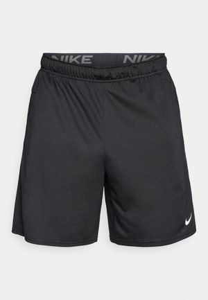 Black Nike shorts with an elastic waistband, featuring a white logo on the lower left hem and a smooth, lightweight fabric texture.