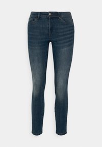 Jeans ajustados de color azul oscuro hechos de denim, con un cierre frontal de botón, cinco bolsillos y un ligero desgastado en las piernas.