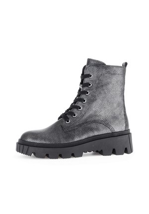 Metallic silver ankle boots with textured finish, lace-up front, chunky black sole, and padded collar for comfort.