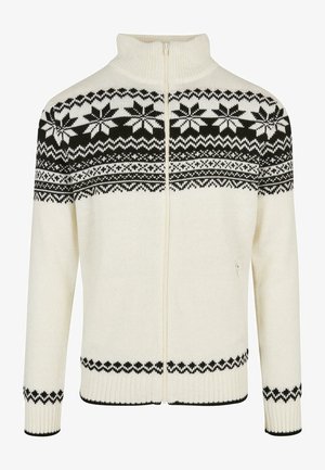 Gebreide trui met hoge kraag, witte body en zwart Fair Isle patroon op de bovenkant, voorzien van een rits en geribde manchetten.