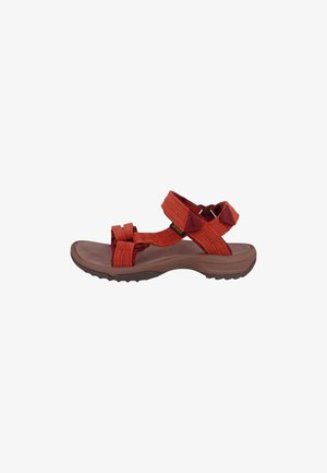 Verstellbare orange Stoffsandalen mit zwei gekreuzten Riemen und einer dicken braunen Gummisohle, die über eine strukturierte Sohle für besseren Grip verfügt.