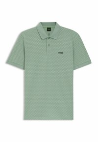 Camiseta tipo pólo en verde claro con patrón hexagonal texturizado. Cuenta con cuello, mangas cortas y el logo "BOSS" en negro en el pecho.