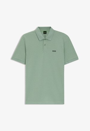 Polo shirt in light green with textured hexagonal pattern. Features a collar, short sleeves, and black "BOSS" logo on the chest.