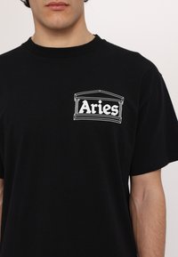 Aries UNISEX czarny