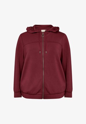 Burgundijas krāsas kapucis ar rāvējslēdzēju, ar viļņainu kapuci, auklītēm un diskretām sānu kabatām. Izgatavots no mīkstas auduma, ar brīvu piegriezumu un elastīgiem piedurkņu galiem.