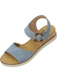 Light blue suede sandal with wide upper strap, adjustable buckle, cushioned footbed, and textured cork wedge sole.