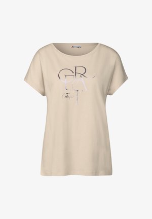 Beige tričko s krátkým rukávem vyrobené z bavlny. Vybaveno velkými stylizovanými nápisy ve tmavých a světlých barvách, kulatým výstřihem a volným střihem.