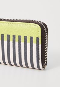 Wallet featuring a striped design in light green and navy blue, textured synthetic material, with a contrasting dark zipper.