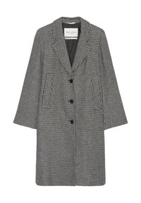 Abrigo de patrón de houndstooth en blanco y negro con cuello con muescas, tres botones negros y bolsillos laterales. Hecho de una tela texturizada.
