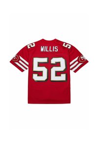 Maillot rouge à manches courtes présentant des accents blancs. Numéro 52 et nom "WILLIS" en blanc et or dans le dos. Écusson du logo NFL sur les manches.