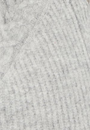 Tissu en tricot gris avec un motif texturé et côtelé. Le matériau semble doux et duveteux, présentant des variations subtiles de teinte.