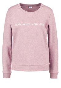 Ljusrosa sweatshirt tillverkad av en blandning av bomull. Har rund halsringning, långa ärmar och texten "ÄGA VEM DU ÄR" i vitt.