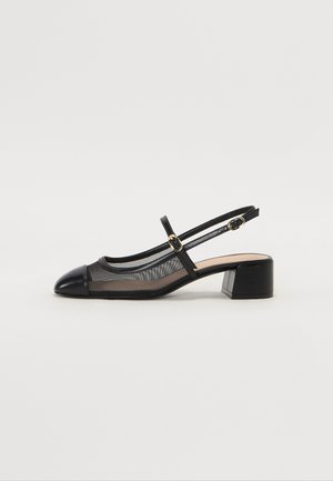Black slingback shoe with mesh and leather materials, rounded toe, small block heel, and a decorative strap with a gold buckle.