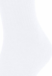 Weiße Baumwollsocke mit gerippter Textur, die ein glattes Finish und eine abgerundete Ferse aufweist. Es sind keine Muster oder Akzente sichtbar.