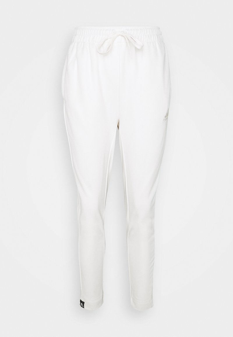 Pantalon de jogging blanc avec cordon de serrage et ceinture élastique, avec un détail de logo près de la cheville, présenté sur un fond uni.