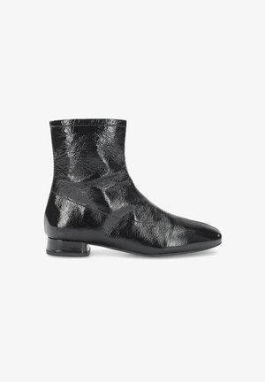 Black ankle boots made of glossy, textured material; pointed toe, short block heel, and a sleek design. Smooth, reflective surface with no visible accents.