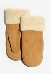 Tans-colored seemisnahast sõrmikud pehme kreemja kunstkarusnahast mansetiga. Ümar kuju, sile tekstuur ja üks avaus käe jaoks.