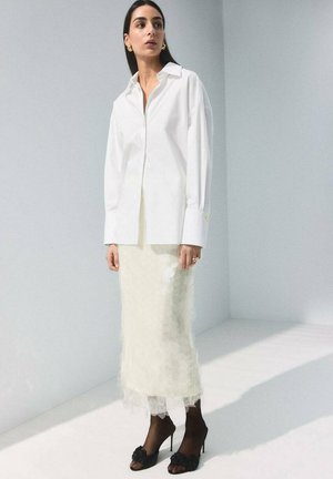 Falda acampanada - off-white