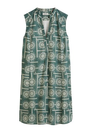 Sleeveless dress in teal fabric featuring a geometric white pattern with circular motifs and an open neckline. Soft, lightweight texture.