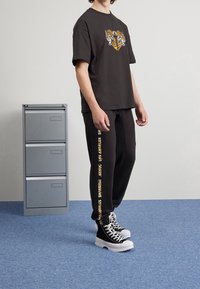 Puma Triko s potiskem - black